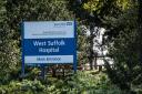 Staff at West Suffolk Hospital will see their benefits decrease later this year with the removal of free hot drinks, evening meals and staff parking.