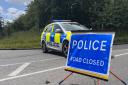 Suffolk Police have closed Eriswell Road near Mildenhall after a two-vehicle collision left a car on its roof