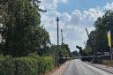 A road in west Suffolk is currently closed after a tree fell down