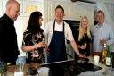 Celebrity chef Peter Sidwell demonstrating his culinary skills at the opening of the Laranza kitchen showrooms on the corner of Hatter and Churchgate Streets in Bury St Edmunds.
Peter Sidwell with co-owners Glyn and Nicola Powell, right, and Tony and Suza
