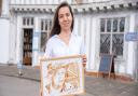 Aleksandra Shevchenko, a Ukrainian artist who has won a competition for her coffee art of the Queen
