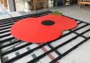 Level two carpentry and joinery students at West Suffolk College have created a seven meter poppy to commemorate Remembrance Day