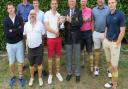 Aldeburgh's Hambro Cup winning team - from left: Logan Mair, Tim Hedin, Jim Harrison, Jack Levermore, team captain Robert Palmer receiving the Hambro Cup from SGU president Colin Firmin, Andy Edmond, James Ollington and Jack Strowger. Picture: TONY