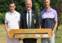 SUFFOLK MATCHPLAY: Runner-up Louis Martin (left), SGU president Colin Firmin and winner James Biggs at Rookery Park with the Presidents Mashie Trophy. Photograph: TONY GARNETT