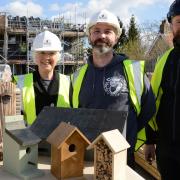 Working together on sustainability, left to right: Ann Bonnett, Chair Girton Town Charity; Keith Colley, Founder Woodmonkey Workshop; Paul Darrington, Site Manager Dovehouse Court, Barnes Construction.