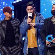 Rudimental at The Global Music Awards in 2019 collecting an award for the Most Played Song.