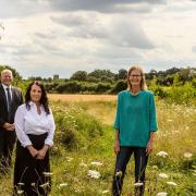 Lovell representatives at the Walsham Wild Woods site with chair of Walsham Wild Wood, Lorna MacKinnon