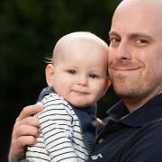 Tom Williams, with his baby Spencer, who shortly after his birth was diagnosed with an infection called Group B Streptococcal. Tom and his family are looking forward to the New Year