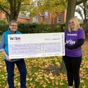 Donna Hazell with her mother Sue with the cheque for the Macmillan Unit at West Suffolk Hospital