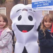 Toothless in Suffolk campaigners taking part in a protest in Bury St Edmunds over the lack of NHS dentists