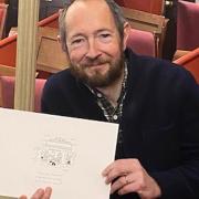 Cartoonist Matt Pritchett with his original work on the Theatre Royal, which will be auctioned off at an evening with him at the theatre on September 12.