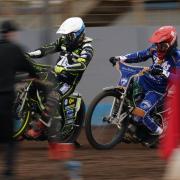 Craig Cook races round Richard Lawson to take victory in heat four.