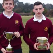 Conal Downing (left) with the Sam Jaggard Trophy and Louis Martin of Haverhill with the Nick Reiss Memorial Trophy. Photograph: CONTRIBUTED