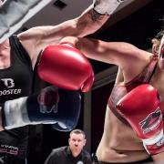Hannah Turner, right, lands a punch during her win over Bryony Tyrell at Super Fight Series. Picture: SUPER FIGHT SERIES