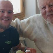 Terry Waite is a long-term supporter of Emmaus Suffolk and is pictured with the charity\'s chef Colton Bridgeman.