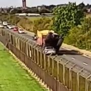 Video footage captured the moment a car and tractor collided outside RAF Mildenhall